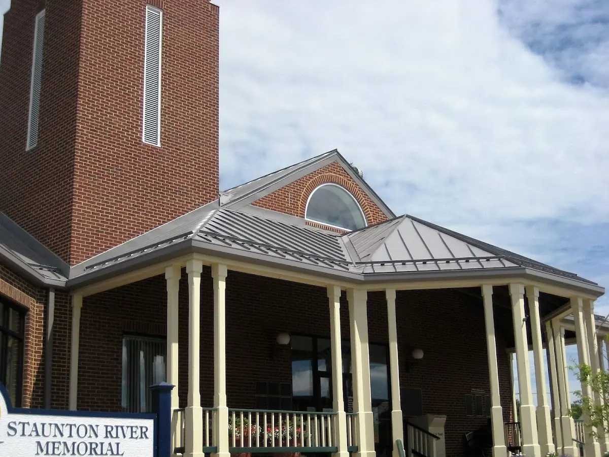 Skilled roofing craftsmen working on a residential roof in Presque Isle